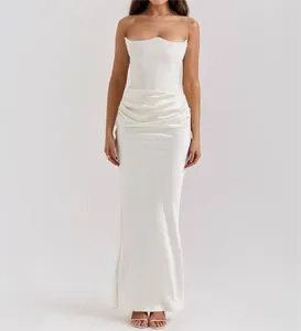 Elegant white strapless mermaid evening gown with corset bodice and draped waist detail
