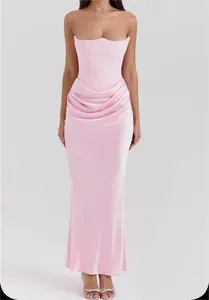 Elegant light pink strapless corset evening gown featuring unique draped waist detailing