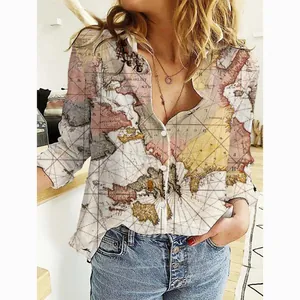 Vintage world map print long sleeve button-down shirt for women styled with denim jeans