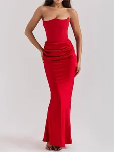 Elegant red strapless floor-length evening gown with pleated waist detail for formal events.