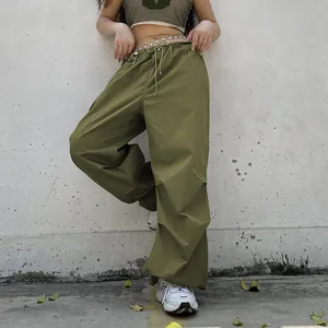 Baggy olive green cargo pants with adjustable drawstring waist and wide-leg fit