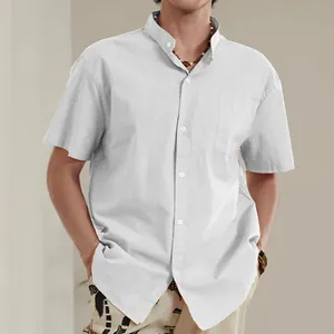 Detail shot of a men's white cotton linen short sleeve shirt with a stylish stand collar
