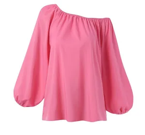 Elegant bright pink off-the-shoulder long sleeve blouse for women with lantern sleeves.