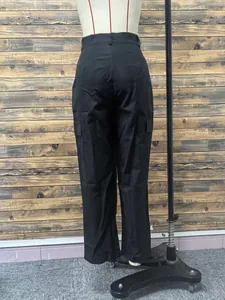 Rear view of black multi-pocket street style cargo pants for women on a mannequin