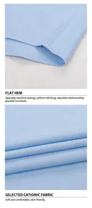 Macro detail showing high-quality stitching and breathable cationic fabric of blue men's shirt