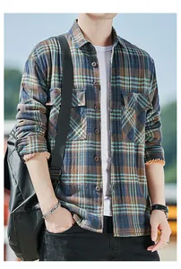 Detailed view of men's plaid shirt featuring warm lamb wool lining and front pockets