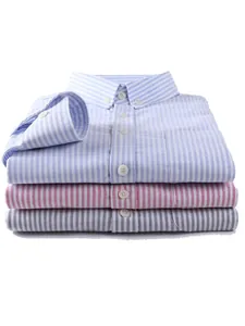 Three neatly folded men's striped cotton oxford long sleeve shirts in classic colors