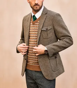 Detailansicht eines britischen Herren-Sakkos mit klassischem Fischgrätmuster.