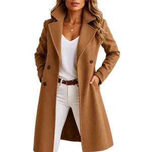Detail of camel wool blend coat featuring elegant lapel collar and double breasted design