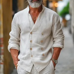Detail view of men's double-breasted linen shirt with stand collar in beige color