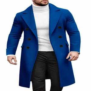 Professional men's royal blue double-breasted wool overcoat paired with white turtleneck