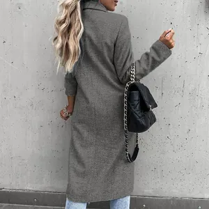 Back view of a long-line grey wool coat with a classic lapel collar for women