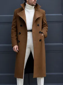 Detail showing the brown woolen fabric of a slim fit double-breasted trench coat for men
