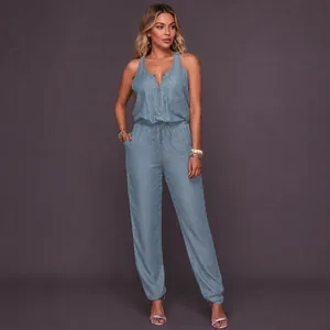 Stylish sky blue sleeveless denim jumpsuit featuring a drawstring waist and zipper front detail
