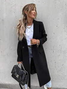 Close-up of a women's black long woolen coat with classic blazer collar design.