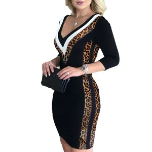 Elegant black V-neck bodycon dress with leopard print side panels and white trim detailing