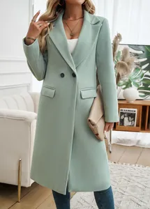 Elegant mint green long wool coat with lapel collar shown on a model in a stylish interior