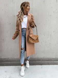 Elegant close-up of a women's camel-colored long coat with a classic lapel collar
