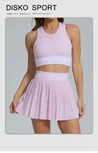 Tweeledige roze yogaset met ademende geplooide tennisrok en sporttop met hoge taille