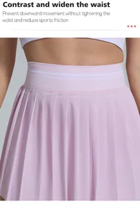 Close-up detail of the widened elastic waistband on a lilac pleated sports tennis skirt