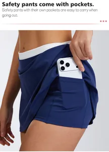 Detail of high-waist tennis skort showing a functional side pocket with a phone
