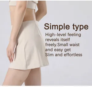 High-waisted beige quick-dry yoga and tennis skirt showing a slim minimalist silhouette