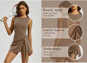 Detail view of a brown tennis dress featuring round neck and built-in safety shorts.