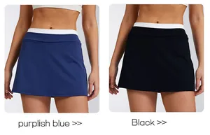 Close-up of high-waist tennis skorts in purplish blue and black colors