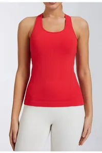 Slim fit red racerback yoga tank top with round neck and breathable side panels.