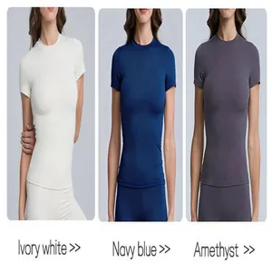 Top da yoga da donna in bianco avorio, blu navy e ametista per il fitness e sport.