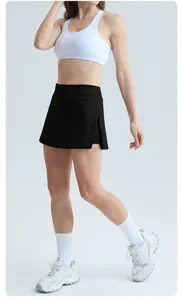 High waist black sports skort with side slit and built-in shorts for tennis fitness