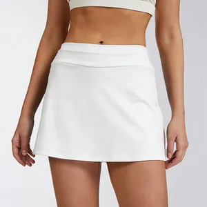Detailed view of white high-waisted ribbed sports tennis skirt with anti-glare design