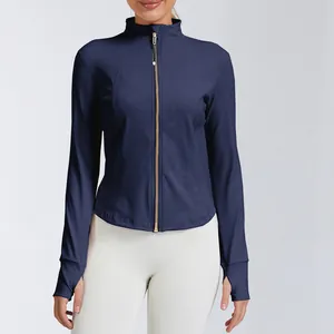 Detail view of a navy blue slim-fit sports yoga jacket with gold zipper and thumb holes