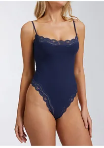 Detail of navy blue lace-trimmed bodysuit with adjustable straps for shapewear yoga