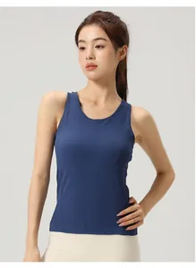 Slim-fit blue yoga tank top with built-in pads and quick-dry fabric on an Asian model