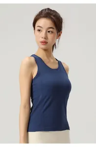 Close-up of slim fit blue yoga tank top with ribbed texture and round neckline