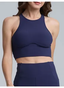 Detailed close-up of a navy blue ribbed high-neck sports bra for yoga and fitness