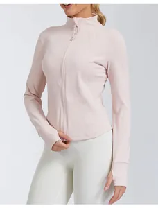 Close-up of a pink slim-fit yoga jacket featuring a stand collar and zip front design.