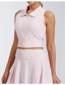 Close-up of women's pink sleeveless polo sports vest with zip front for tennis