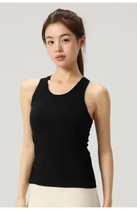 Close-up of slim-fit black yoga tank top with rib-knit texture and built-in pads