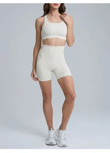 Detailed view of high-waist peach butt lifting yoga shorts and sports bra set