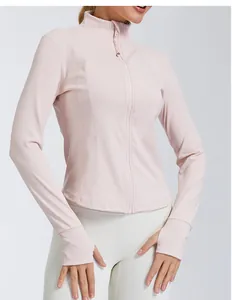 Close-up of a women's slim-fit quick-dry pink yoga jacket with stand collar