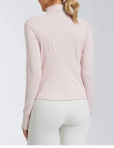Back view detail of pink slim-fit stand-collar yoga jacket showing seam design