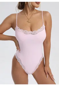 Pink ribbed bodysuit featuring delicate floral lace trim and adjustable thin spaghetti straps.