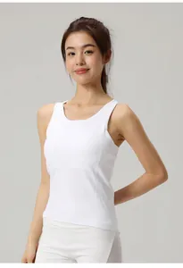 Professional front view detail of white round neck yoga tank top on model wearing