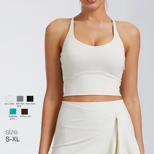 Soutien-gorge de sport ivoire avec dos croisé et jupe portefeuille assortie