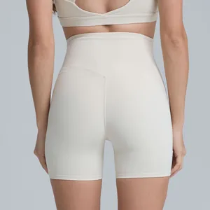 Women's high-waisted peach butt lifting yoga shorts for fitness and running in cream