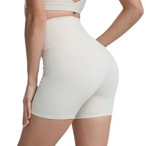Beige high waisted peach butt lifting yoga shorts for women's fitness and running