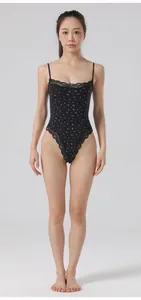 Full length front view of a black floral lace bodysuit featuring adjustable thin straps