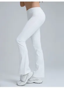 Side view of high-waisted white flared yoga pants for outdoor running and fitness.